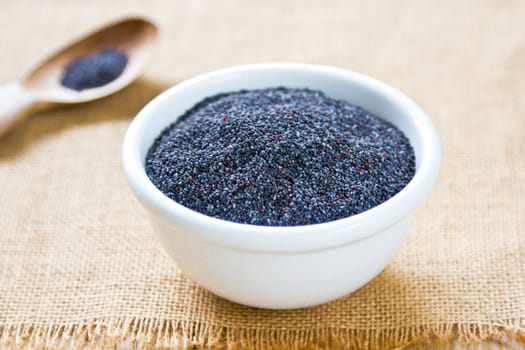 Blue seal Poppy seeds in a white bowl