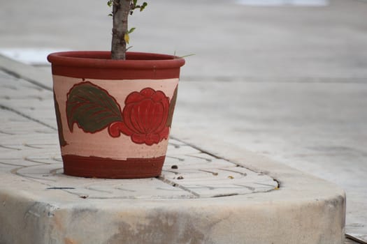 There's a pottery on the footpath.It may jumblingly but so cute.