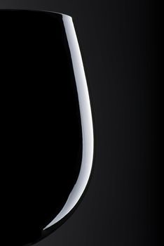 Silhouette of a Wine Glass on a Dark Background