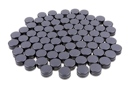 A Pile of Black Metal Screw Caps Isolated On White Background