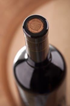 Bottle of Red Wine On A Barrel with shallow depth of field