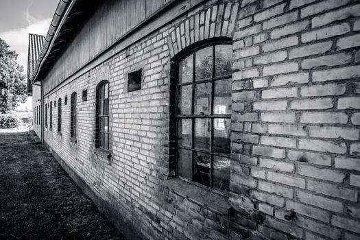 Old and grungy barn house in black and white