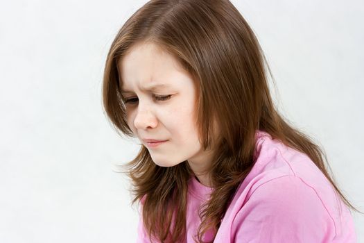 Upset crying teen girl close-up. Portrait