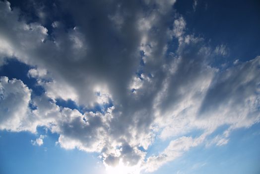 blue sky with clouds closeup with sunset