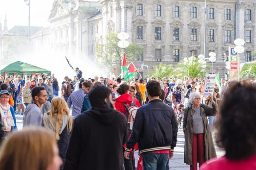 MUNICH, GERMANY - AUGUST 16, 2014: Inscription on the poster: Freedom for Palestine - Peace for Israel. European activists demand to withdraw the war in Gaza and end the Palestine occupation.