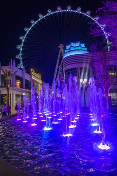 LAS VEGAS - MARCH 15 : The Linq, a dining and shopping district and High Roller at the center of the Las Vegas Strip on March 15 2014 , The High Roller is the world's largest observation wheel