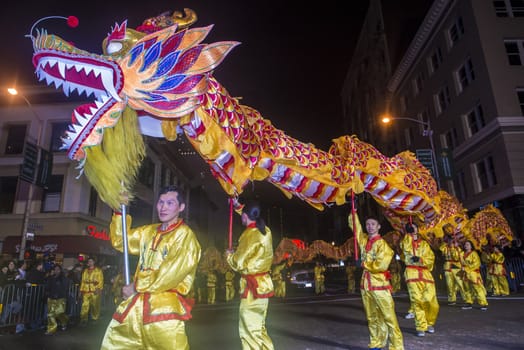 SAN FRANCISCO - FEB 15 : An unidentified participants in a Dragon dance at the Chinese New Year Parade in San Francisco , California on February 15 2014 , It is the largest Asian event in North America 