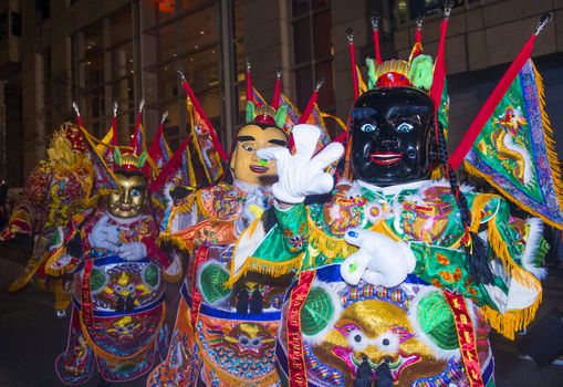 SAN FRANCISCO - FEB 15 : An unidentified participants with traditional man-size costumes at the annual Chinese new year parade on February 15 2014 on San Francisco , California