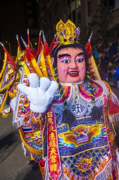 SAN FRANCISCO - FEB 15 : An unidentified participants with traditional man-size costumes at the annual Chinese new year parade on February 15 2014 on San Francisco , California