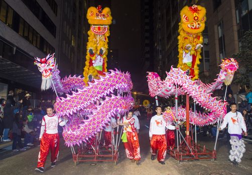 SAN FRANCISCO - FEB 15 : An unidentified participants in a Dragon dance at the Chinese New Year Parade in San Francisco , California on February 15 2014 , It is the largest Asian event in North America 