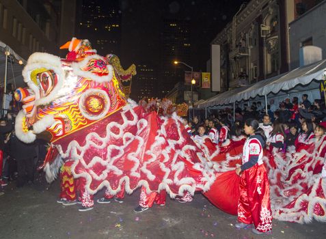 SAN FRANCISCO - FEB 15 : An unidentified participants in a Dragon dance at the Chinese New Year Parade in San Francisco , California on February 15 2014 , It is the largest Asian event in North America 