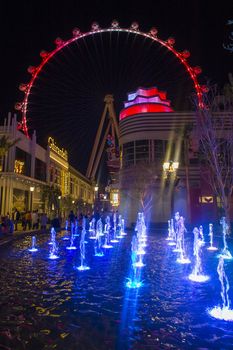 LAS VEGAS - MARCH 15 : The Linq, a dining and shopping district and High Roller at the center of the Las Vegas Strip on March 15 2014 , The High Roller is the world's largest observation wheel