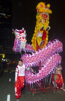 SAN FRANCISCO - FEB 15 : An unidentified participants in a Dragon dance at the Chinese New Year Parade in San Francisco , California on February 15 2014 , It is the largest Asian event in North America 