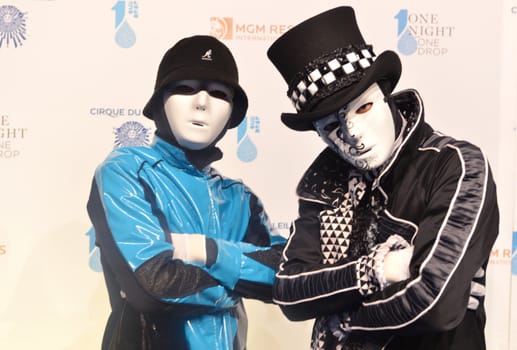 LAS VEGAS - MARCH 21:  Members of the Jabbawockeez dance crew arrives at Cirque du Soleil's annual 'One Night for One Drop' at the Mandalay Bay Resort and Casino on March 21, 2014 in Las Vegas, Nevada