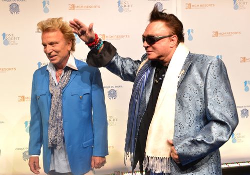 LAS VEGAS - MARCH 21: Former magicians Siegfried (L) and Roy arrives at Cirque du Soleil's annual 'One Night for One Drop' at the Mandalay Bay Resort and Casino on March 21, 2014 in Las Vegas, Nevada