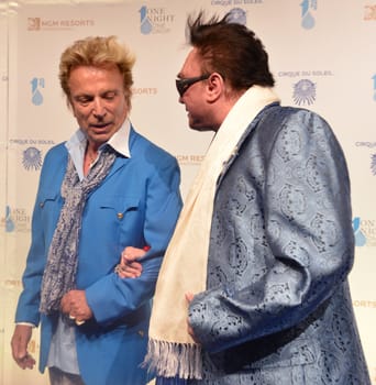 LAS VEGAS - MARCH 21: Former magicians Siegfried (L) and Roy arrives at Cirque du Soleil's annual 'One Night for One Drop' at the Mandalay Bay Resort and Casino on March 21, 2014 in Las Vegas, Nevada