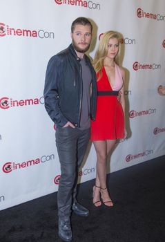 LAS VEGAS, NV - MARCH 24: actors Jack Reynor (L) and Nicola Peltz arrives at the 2014 CinemaCon Paramount opening night presentation at Caesars Palace on March 24, 2014 in Las Vegas, Nevada