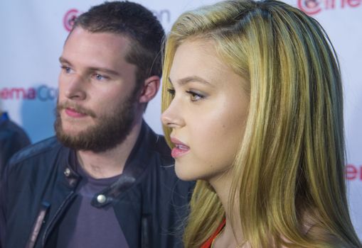 LAS VEGAS, NV - MARCH 24: actors Jack Reynor (L) and Nicola Peltz arrives at the 2014 CinemaCon Paramount opening night presentation at Caesars Palace on March 24, 2014 in Las Vegas, Nevada