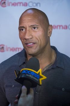 LAS VEGAS, NV - MARCH 24:  Dwayne Johnson (The Rock) arrives at the 2014 CinemaCon Paramount opening night presentation at Caesars Palace on March 24, 2014 in Las Vegas, Nevada