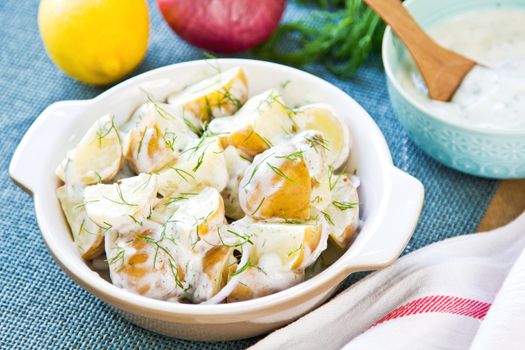 Potato with dill in sour cream dressing salad