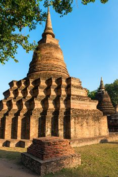 Ruins of Buddhist stupa or chedi in Sukhothai historical park in Wat Mahathat temple.