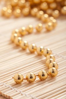 Gold pearls with shallow depth of field