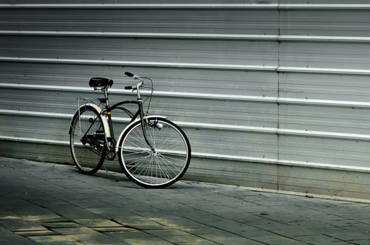 Nice bicycle park beside the steel wall