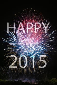 Happy New Year 2015 with colorful sparklers. The words Happy 2015 are integrated into the fireworks with black background