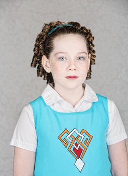 Female Irish child with freckles and curls