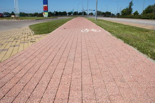 brick paved bikeway at side of the street
