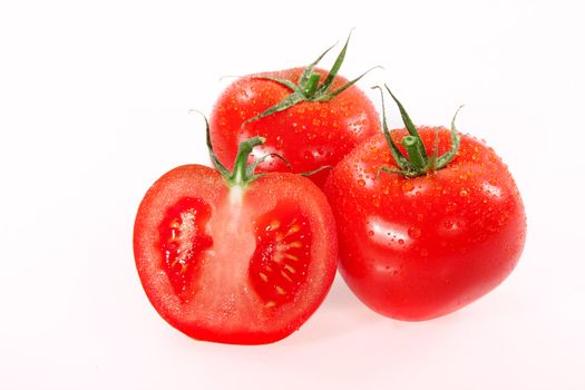 Red tomatos photo on the white background