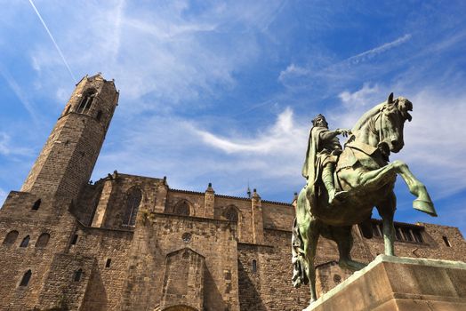 Statue of Ramon Berenguer III (1086-1131) in the homonymous square. In the background the Chapel of St. Agata. Barcelona, Catalonia, Spain