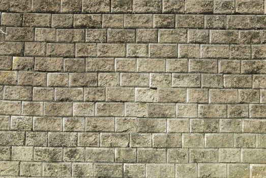 Stone brick wall with  weathered cement  background