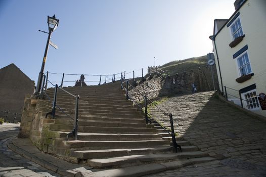 Church stairs in Whitby, North Yorkshire, winding their way up Tate Hill from the town to St Mary's medieval church