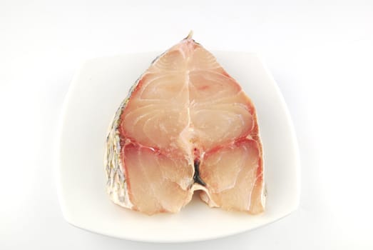 Fresh uncooked red fish meat fillet on white background