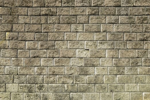 Stone brick wall with  weathered cement  background