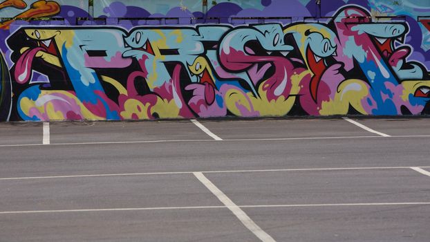 Graffiti on a Wall in a car Park