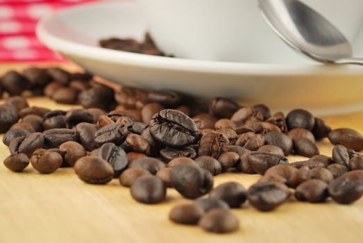 Coffee beans and coffee mug