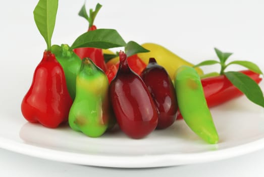 Thai style marzipan fruits. Thai dessert fruit-imitated soybean dumpling coated with jelly
