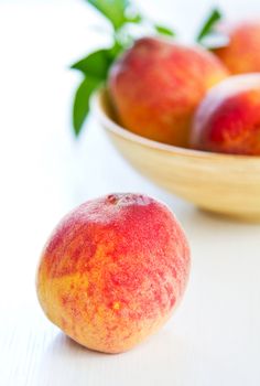 Fresh Peachs in a wood bowl