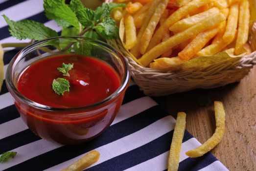 Traditional French fries with ketchup