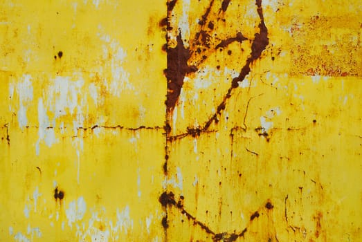 Yellow painted metal with rust texture