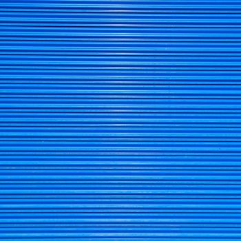 a shuttered roll up metal blue door