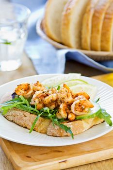 Grilled prawn with herbs and rocket sandwich