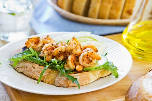 Grilled prawn with herbs and rocket sandwich