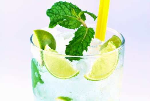 Mojito , lime pieces , leaves of mint with ice and rum