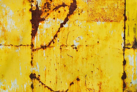 Yellow painted metal with rust texture