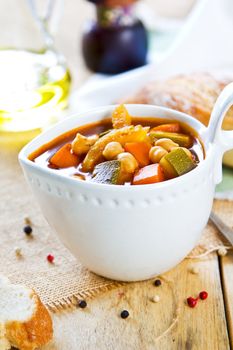 Vegetables with Chickpea soup by loaf of bread