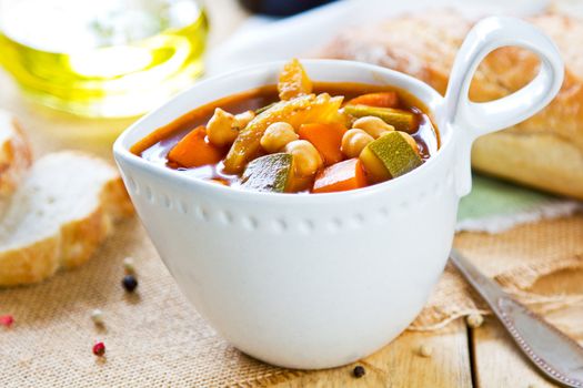 Vegetables with Chickpea soup by loaf of bread