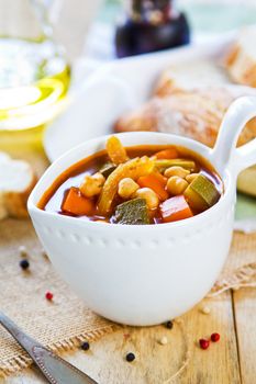 Vegetables with Chickpea soup by loaf of bread